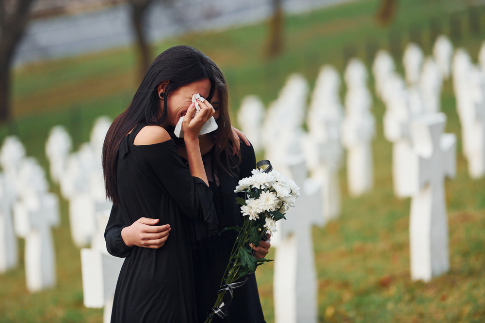 grieving sisters