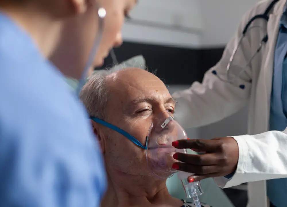 Elderly man using an oxygen