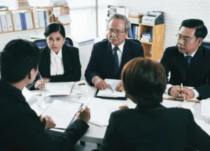 legal team in discussion with a client