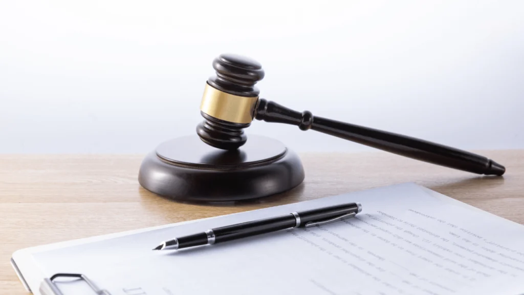 Gavel and legal papers - Largest Wrongful Death Settlements.