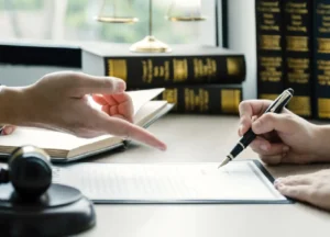 Person reviewing legal documents to understand their rights after toxic exposure